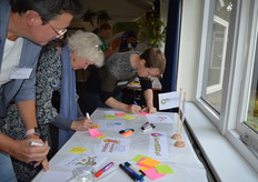 Merle Koomans van den Dries, Edith Lammerts van Bueren en Laurens Nuijten (verenigingsmanager Biohuis).