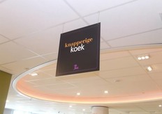 Deze borden wijzen de klant door de hele winkel de weg.