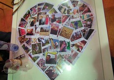 Foto's van diverse medewerkers en leveranciers van de coöperatieve groothandel verwerkt in een hart.