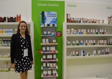 Céline Jansen poseert namens Ron Zwakhals in de stand van Océ Bio. Océ Bio heeft een vestiging in Tilburg en in Wommelgem (België).