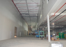 Een deel van het nieuwe magazijn, om precies te zijn is dit het gedeelte achter de 36 laaddocks. "Dit deel van het gebouw is tien meter dieper dan in ons huidige pand, waardoor we veel meer ruimte hebben om alles klaar te zetten."